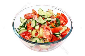 Salad in glass bowl isolated
