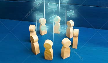 Speech clouds in the center of a people circle. Discussion processes in a team or community. Share opinion, diplomacy