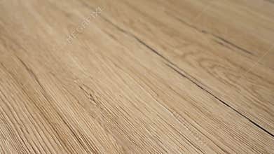 Wood flooring concept newly installed. Floor made with dark grains and brownish clear natural colors of maple hard wood. Video mad