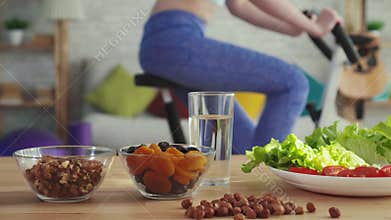 Concept of proper nutrition, on the table are vegetables fruits and nuts close up