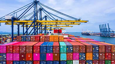 Container ship loading and unloading in deep sea port, Aerial top view of business logistic import and  export freight
