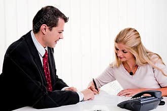 Woman signs a contract