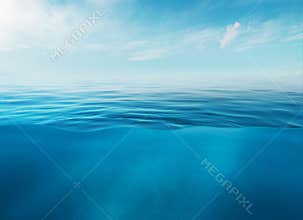 Blue sea or ocean water surface and underwater with sunny and cloudy sky