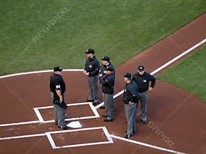 Head Umpire talk to five other umpires