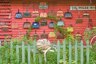 Barn Wall covered in Vintage Dust Pans