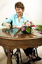 Disabled Florist Trims Babys Breath