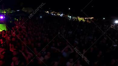 Top sky view of huge public crowd of fans at open air concert Prodigy rock star band musical perfo