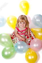 4 Year Old Girl Looking Up with Balloons