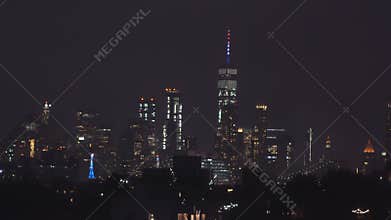 Amazing sparkling fireworks Manhattan Bridge at dusk from New York City defocused abstract city