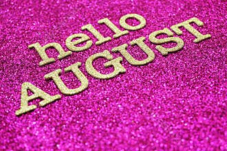 Happy august alphabet letters on pink glitter background