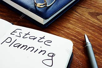 Estate planning handwriting sign on the sheet