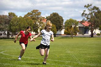 Girls running in sports race