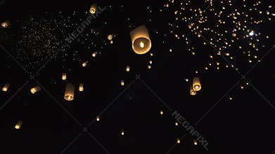 Hand releasing lanterns in festival Chiang Mai Thailand