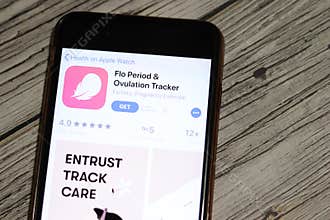 Los Angeles, California, USA - 28 November 2019: Flo Period and Ovulation Tracker app icon on mobile phone screen top view,
