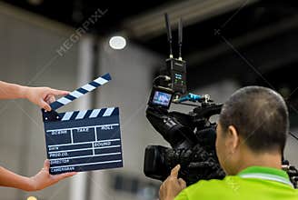 Man hands holding movie clapper.Film director concept.camera show viewfinder image catch motion in interview or broadcast wedding