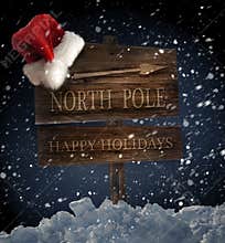Wooden sign with Santa hat