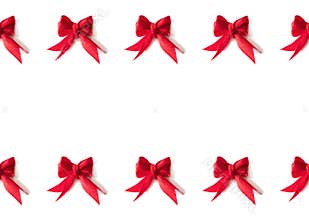 Holiday border from red small textile ribbon bow isolated on white background, clipping path. Cute frame for gift card, wedding