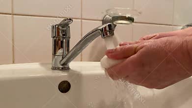 Washing hands with soap