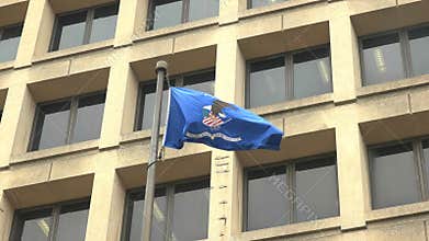 Close up of the department of justice flag on the fbi building in d.c.