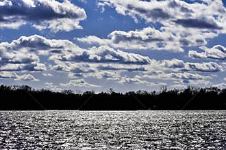 Cumulus Clouds Above a Lake