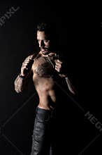 Sexual desire and attraction. muscular man use leather belt. fetish. bdsm love game. Sportsman bare chest and belly