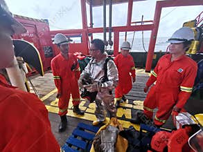 Marine  crews conduct fire drill on board ship