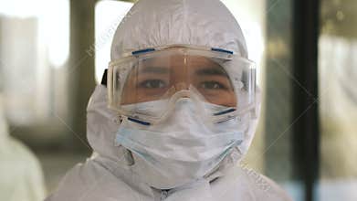 Portrait of epidemiologist protecting patients from coronavirus COVID-19 in mask