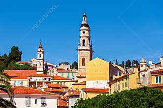 Belfries among colorful houses of Menton, France.