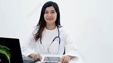 4K. online doctor consulting. Asian doctor talking directly to the camera for consulting online patient via video call