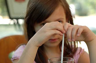 Little girl with drink