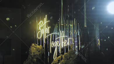 Neon glowing wedding lettering better together hanging on the wall light spots from disco ball, decoration for the