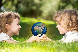 Earth in children`s hands