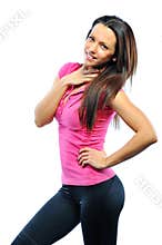Happy female fitness model looking at camera