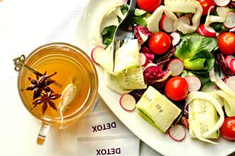 Detox diet with veggie salad and herbal tea
