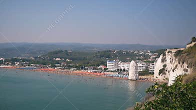 view of beach of Vieste with undefined people - IT