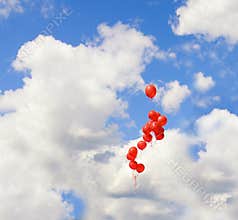 Red baloons in the sky
