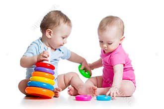 Kids boy and girl play toys together