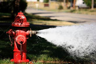 Open Fire Hydrant Spraying High Pressure Water