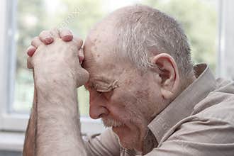 Old man praying