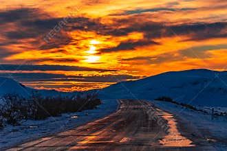 Slippery road in mountainous area at dawn time