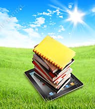 Books on ipad in nature - clipping path