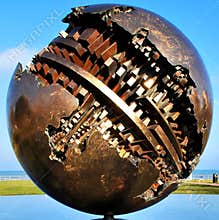 The large bronze sphere, by artist Arnaldo Pomodoro