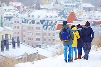 young people look at the roofs of Kyiv houses