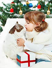 Girl hugging a cat