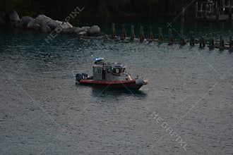 U.S. Coast Guard Patrol Boat in Coastal Waters at Dusk