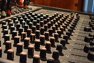 audio mixer showing buttons and slides