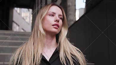 Portrait of sad young caucasian woman suffering from depression anxiety loneliness or mental health problem outdoors