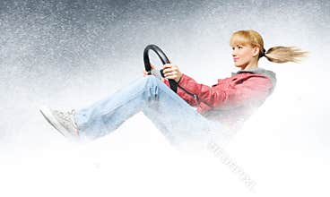 Woman car driver, concept of winter driving