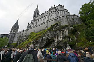 Morning prayers at the Grotto of Massabielle, the religious heart of the Sanctuary of Our Lady of Lourdes, France
