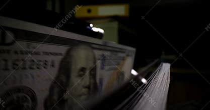 Macro counter counts American currency bills